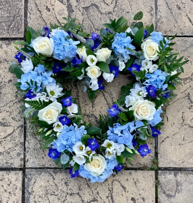 17” roses, hydrangea, delphinium and mixed flower heart in blue and white.