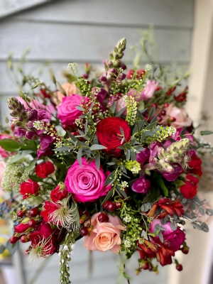 A stunning, luxurious hand tied bouquet presented in an included glass fish bowl.