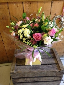 Pink and white florists choice gift boxed aqua bouquet.