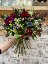 Luxurious festive hand tied bouquet, bouquet will be delivered wrapped in paper with a bow to complement.