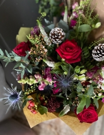 Luxurious festive hand tied bouquet, bouquet will be delivered wrapped in paper with a bow to complement.