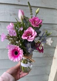 Pretty florists choice jar of flowers.