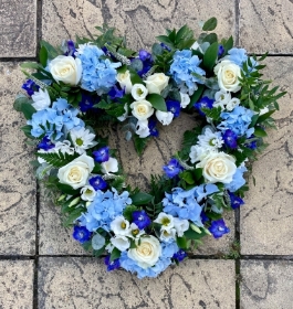 17” roses, hydrangea, delphinium and mixed flower heart in blue and white.