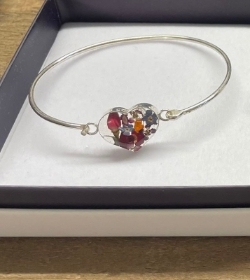 Beautiful handmade sterling silver heart bangle with real flowers by Shrieking Violet!