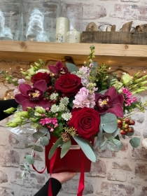 Beautiful Valentines bouquet presented in a gift box in water.