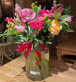 Bright and beautiful bouquet in an included eco vase.