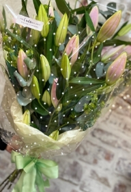 Gift wrapped bouquet of oriental pink lilies (please state in notes if you’d prefer white lilies).