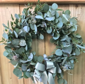 Hand made mixed eucalyptus wreath on a moss base.
