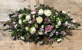 Pretty mixed flowers coffin spray