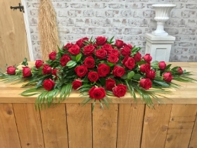 Red roses coffin spray