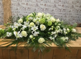 Rose, orchid and mixed flower coffin spray