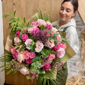 Stunning ‘Pretty in pink’ 48 roses bouquet presented in a large vase in a gift box with a satin bow.