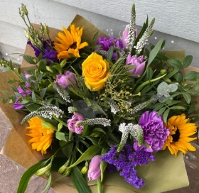 Yellow, purple and white gift box flowers.